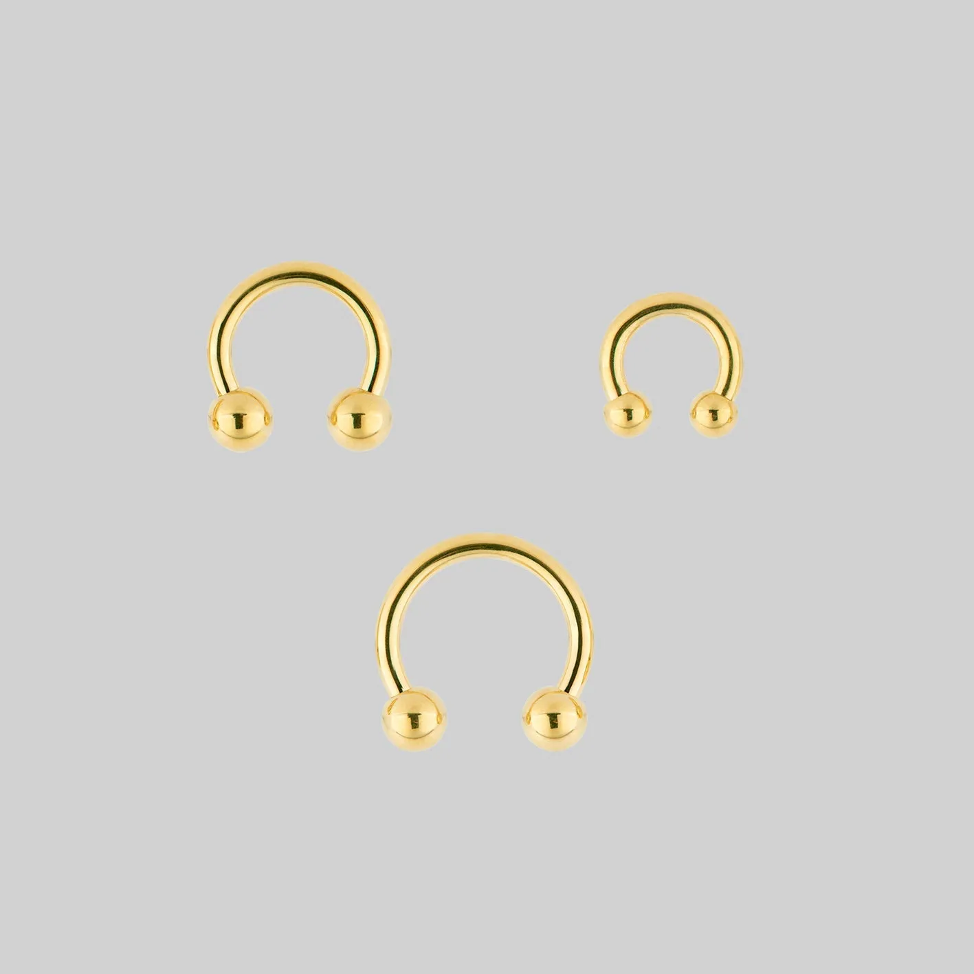 CLEO. Circular Barbell Ring - Gold